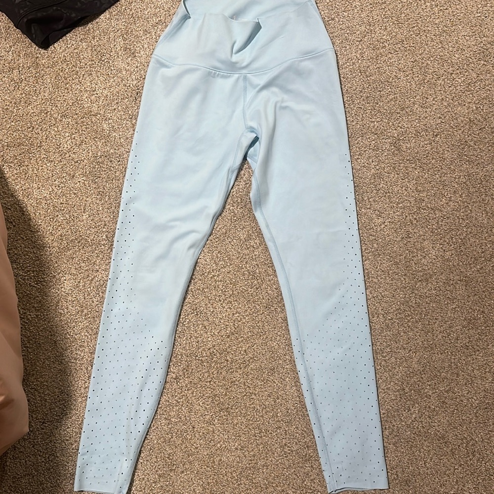 Size medium like new beautiful baby blue Buffbunny leggings